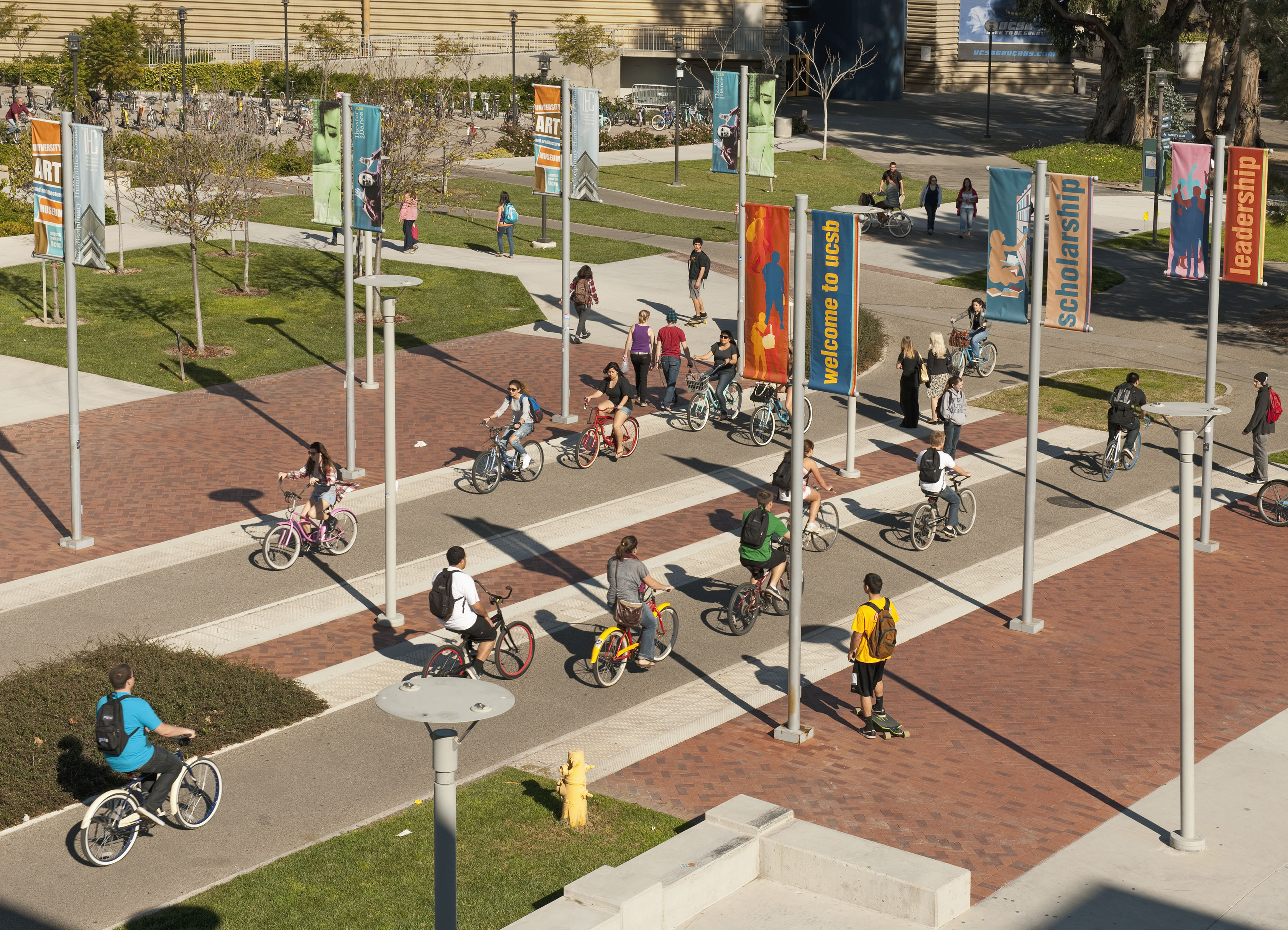 Aerial view of students riding bikes on campus